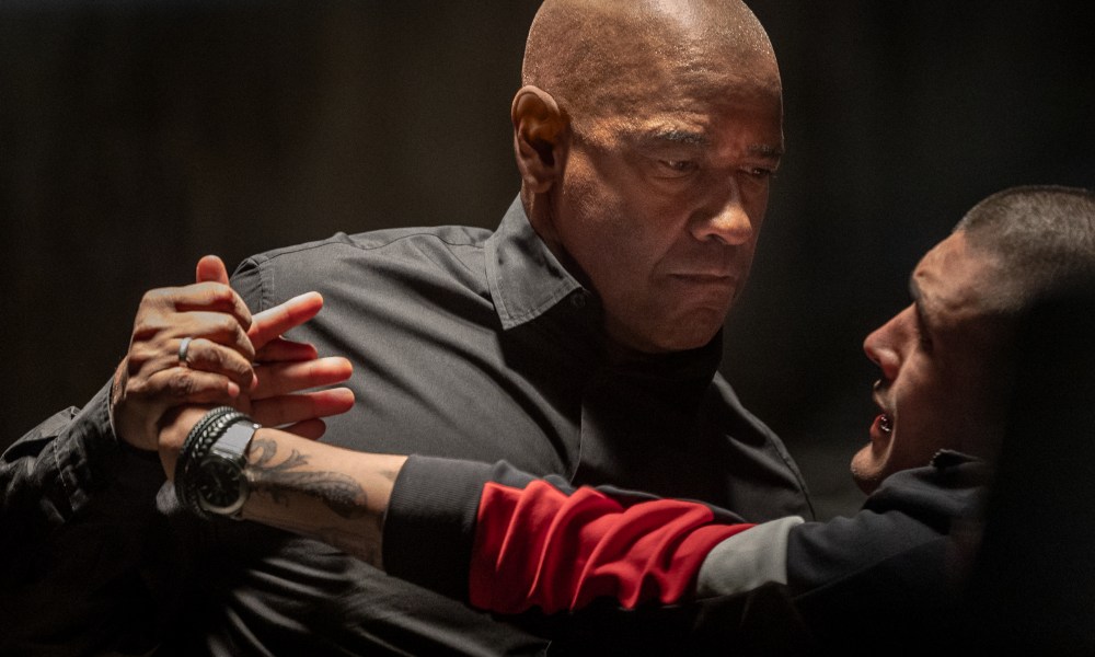 Denzel Washington twists a gangster's wrist in The Equalizer 3.