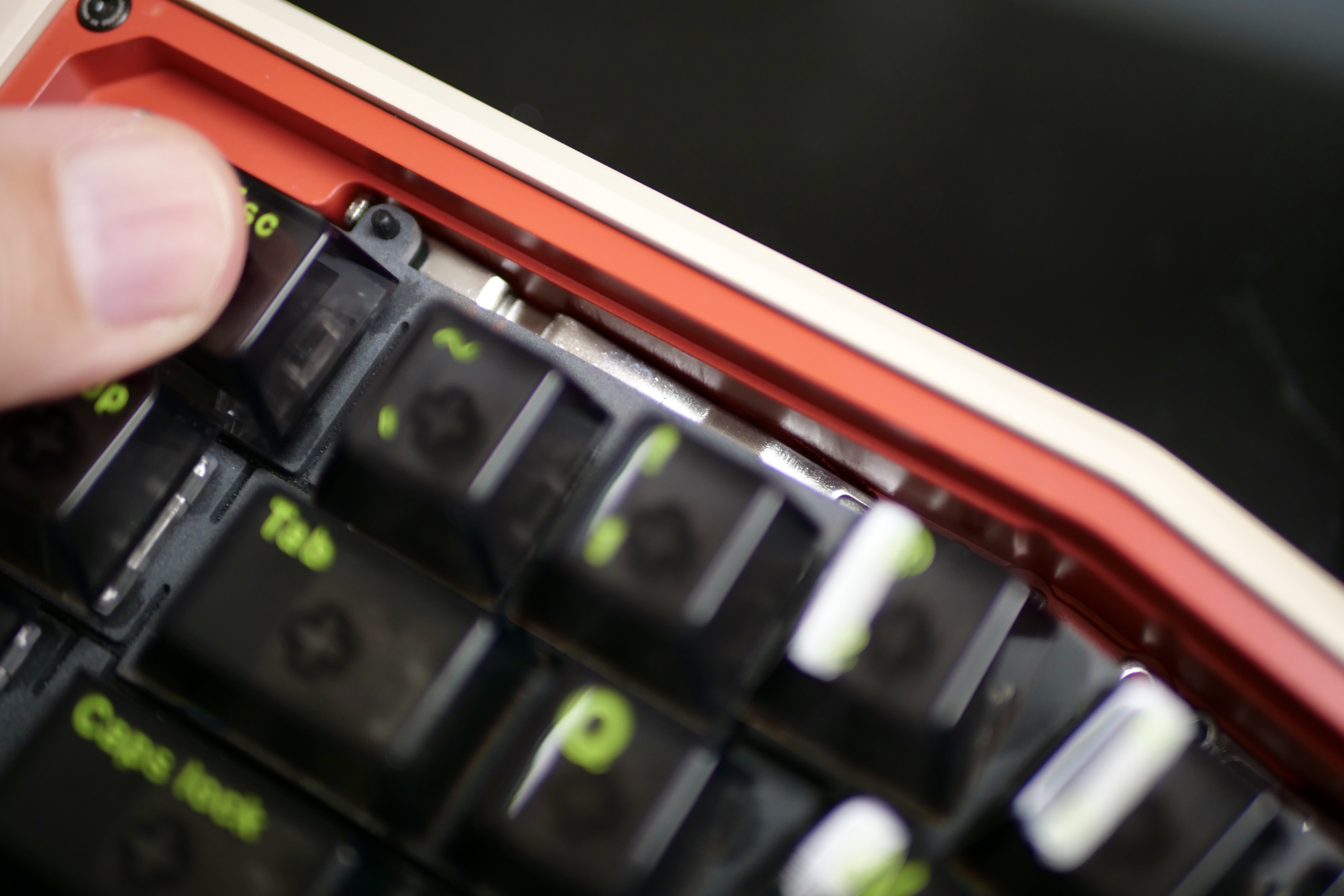 Keypad resting on the Angry Miao AM AFA R2 keyboard's leaf spring suspension.