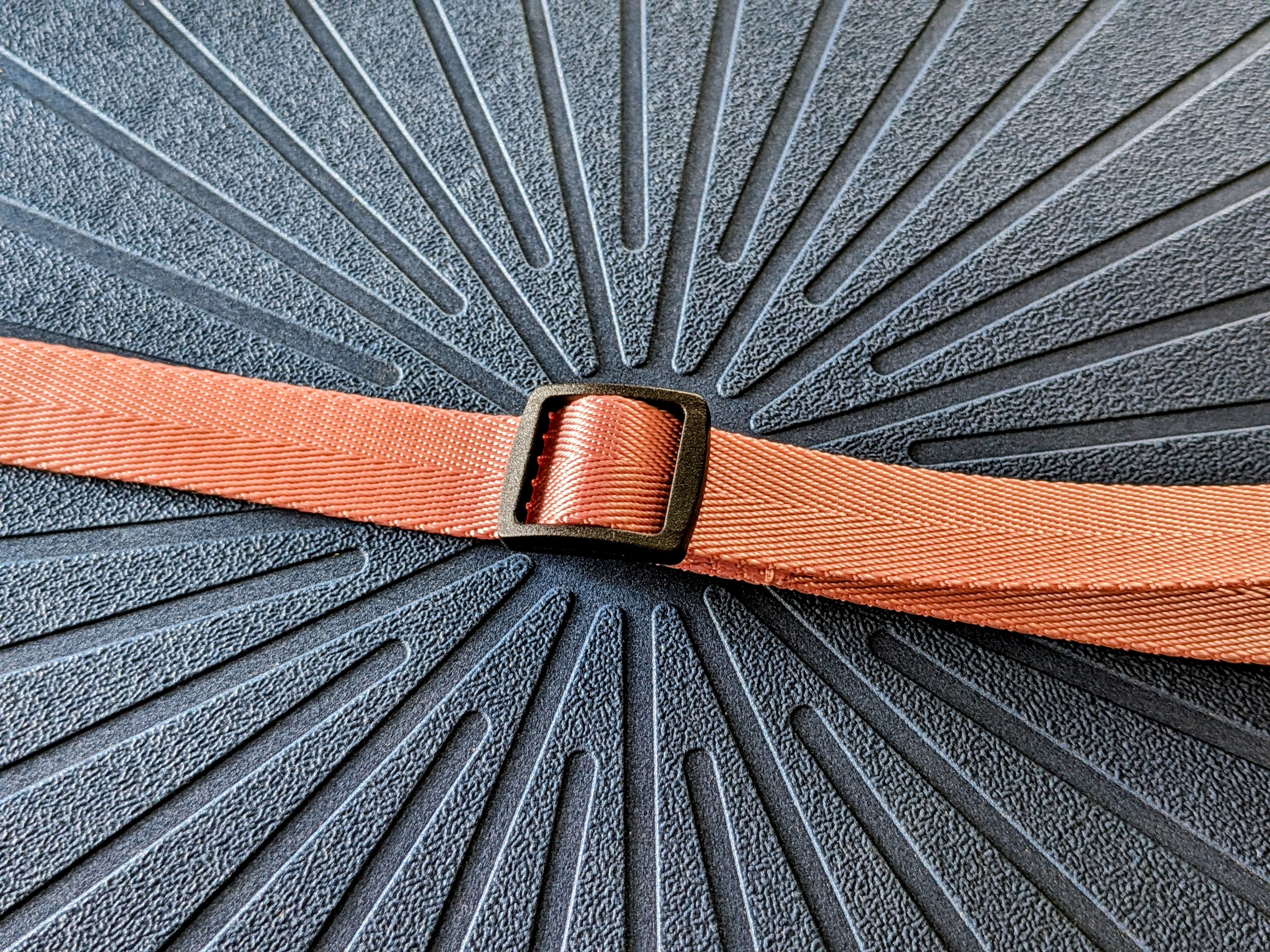 Casetify's Utility Crossbody Lanyard strap adjustment.