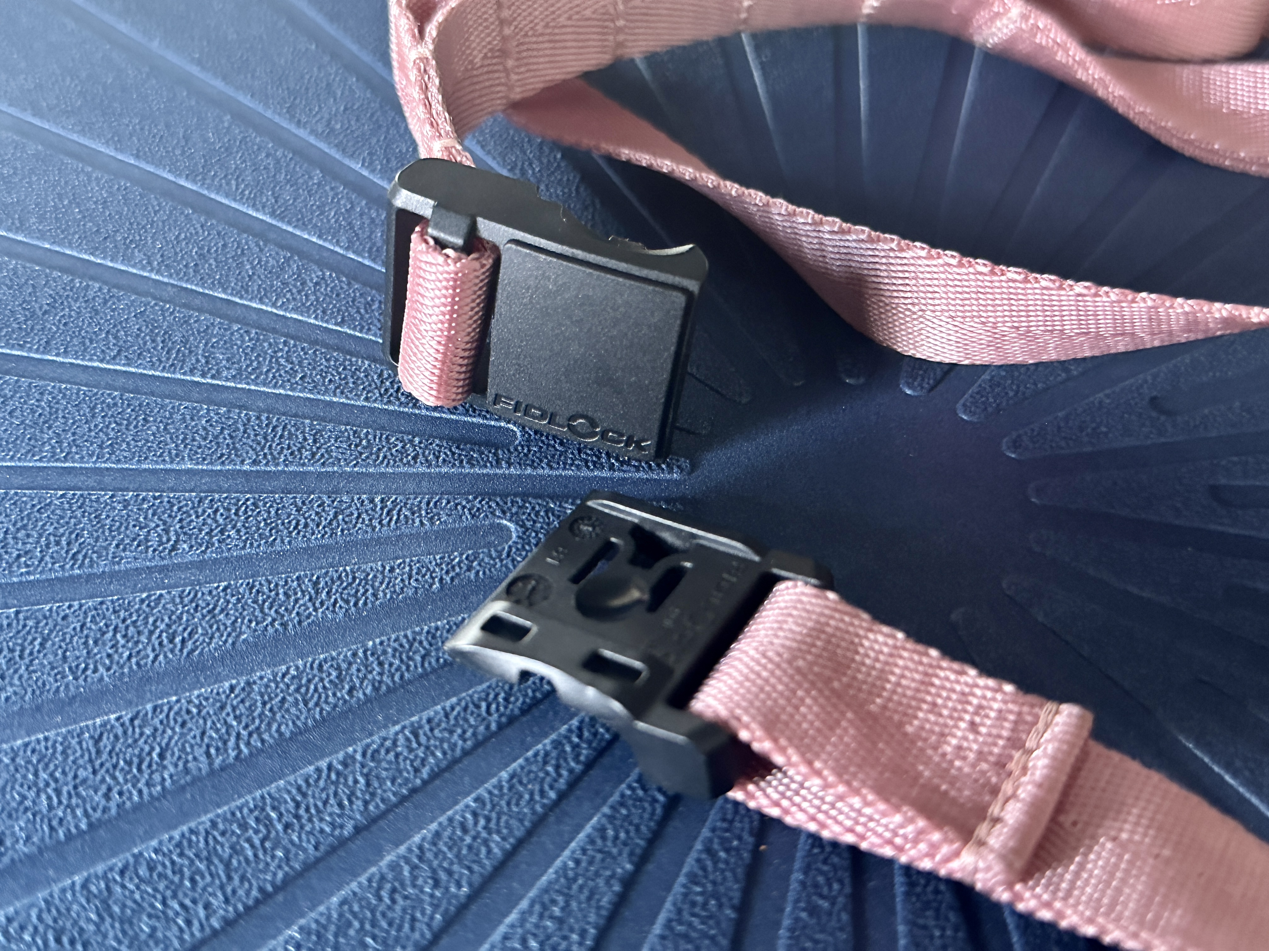 Casetify's Utility Crossbody Lanyard strap fidlock clasp open.