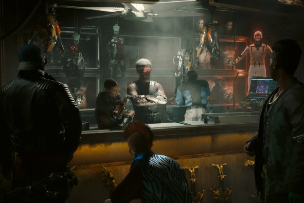 People standing at a robotics shop in Phantom Liberty.