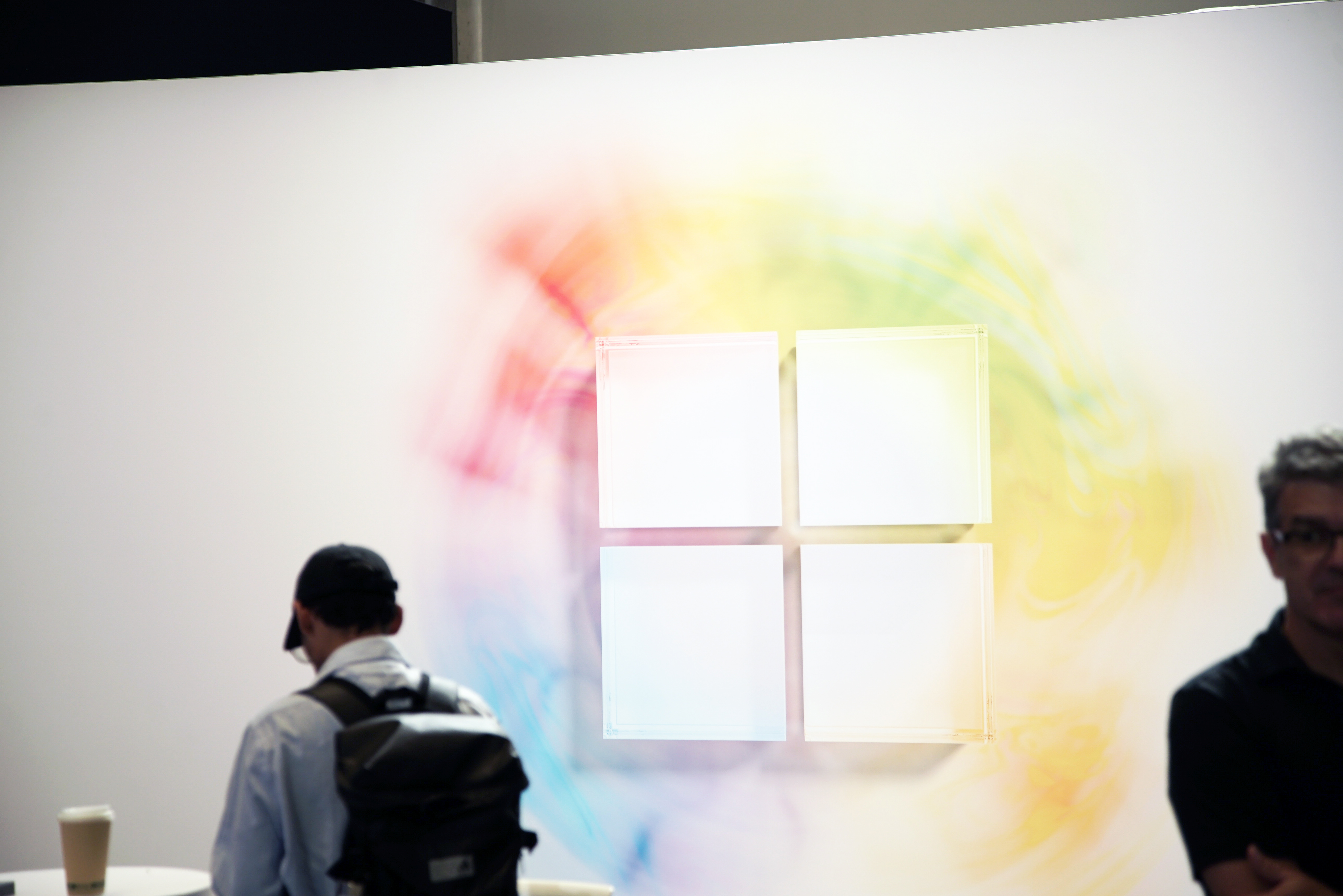 Microsoft logo surrounded by a rainbow of colors, displayed at the Microsoft September Event.