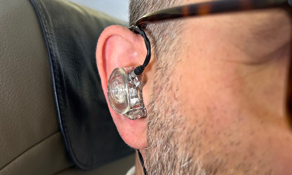 Front view of Simon Cohen wearing the Ultimate Ears Premier wired IEMs.