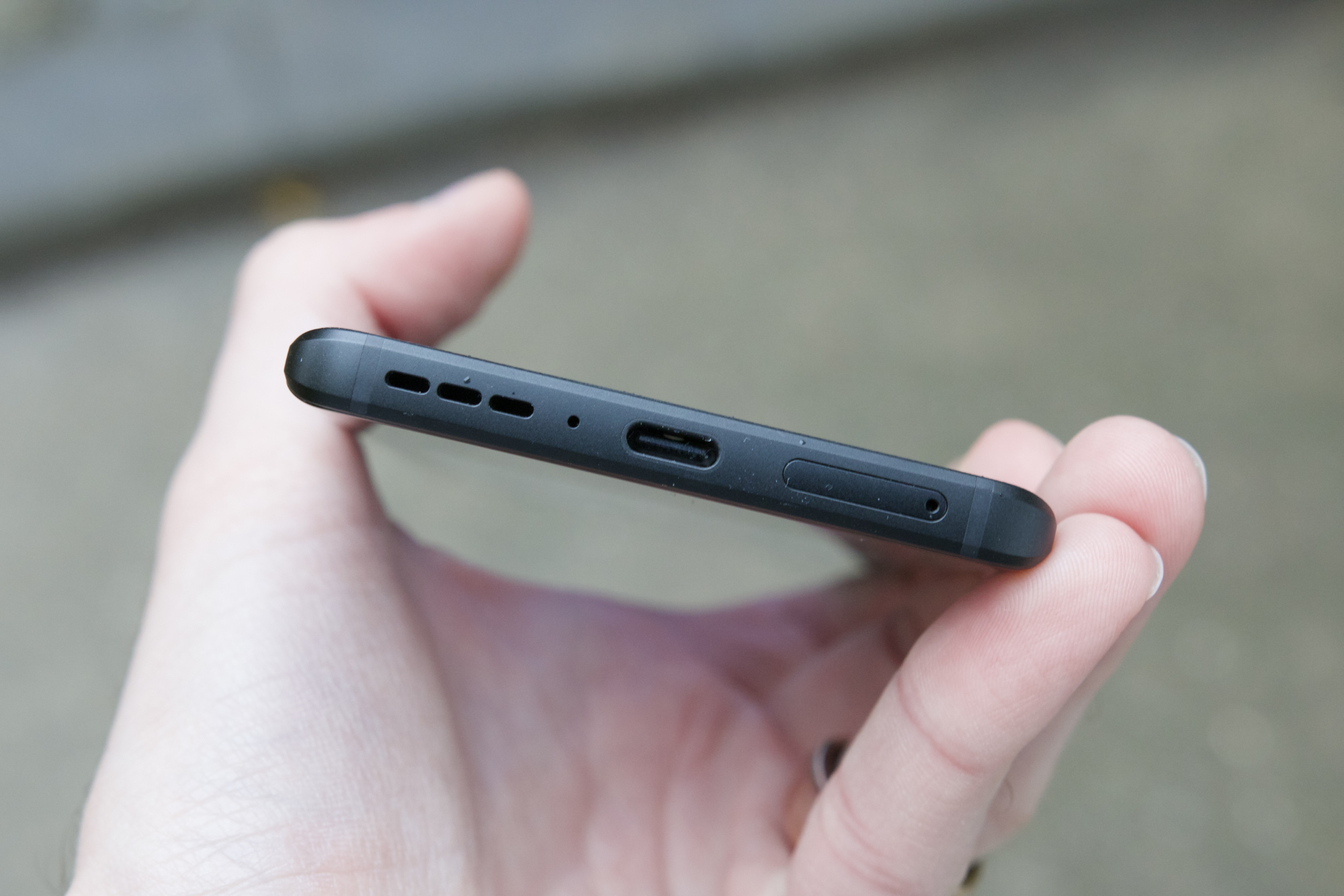 The USB-C port and speaker grille on the Motorola Edge (2023).