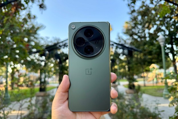 OnePlus Open in Emerald Dusk in hand.