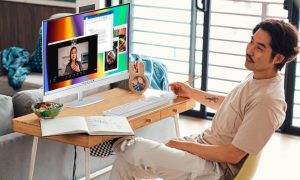 A man does creative work at the HP 27-inch all-in-one PC.