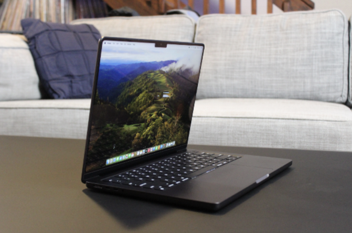 The MacBook Pro open on a table.