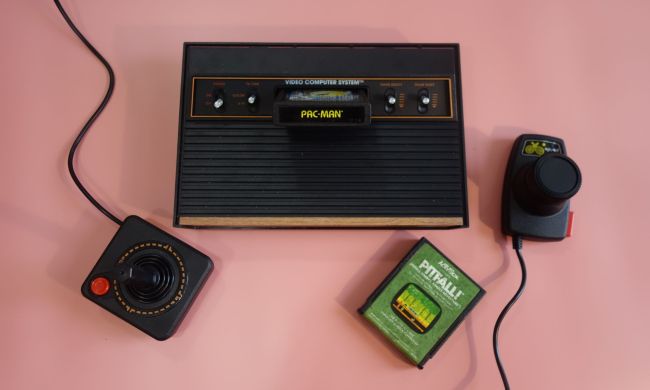 An Atari 2600+ sits on a table.