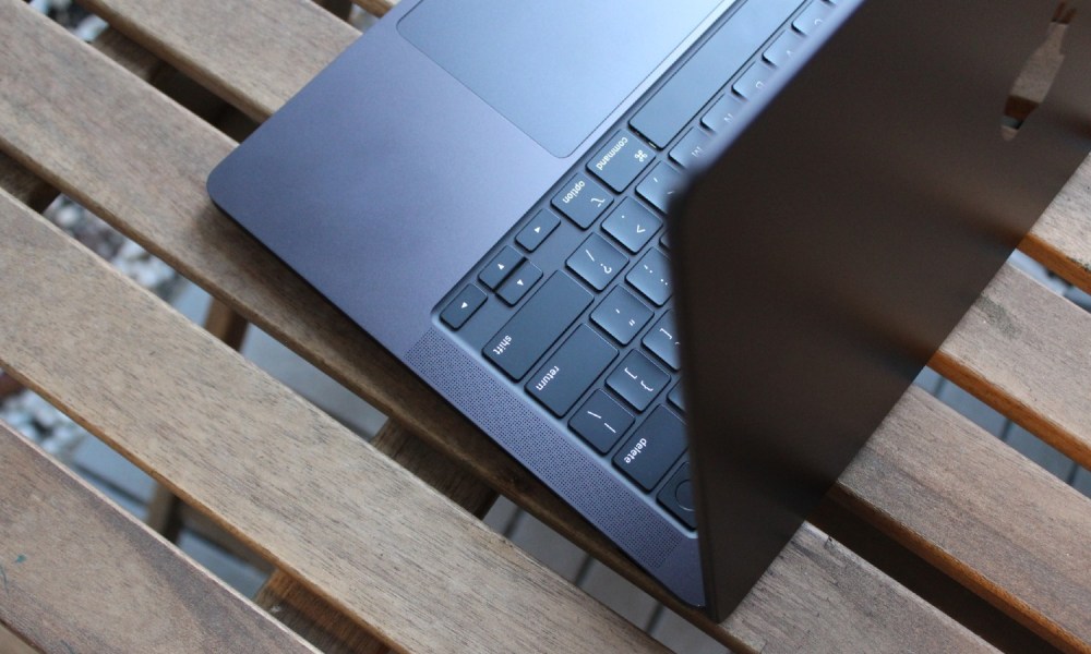 Looking down at the keyboard and trackpad on a MacBook Pro.