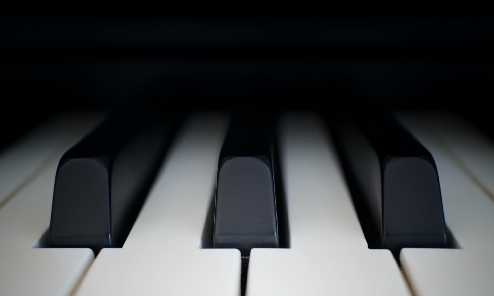 A closeup view of piano keys.