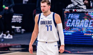 Luka Doncic walks down the court for the Mavericks.