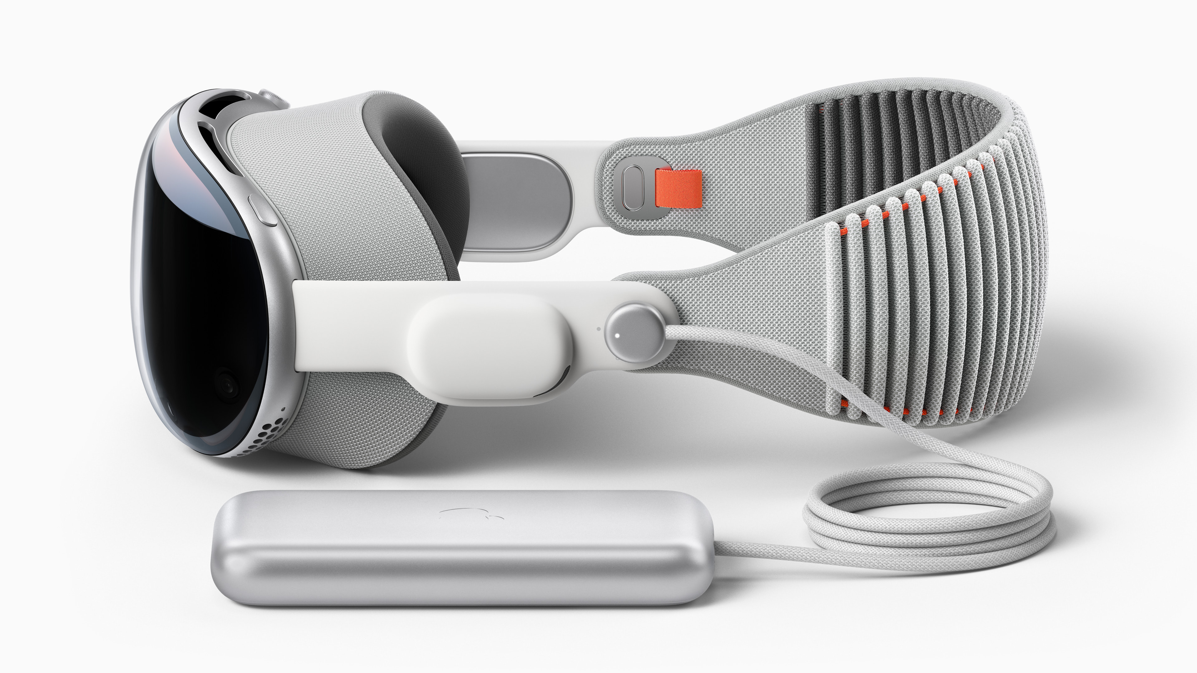 A rendering of the Vision Pro headset connected to the wired battery pack.