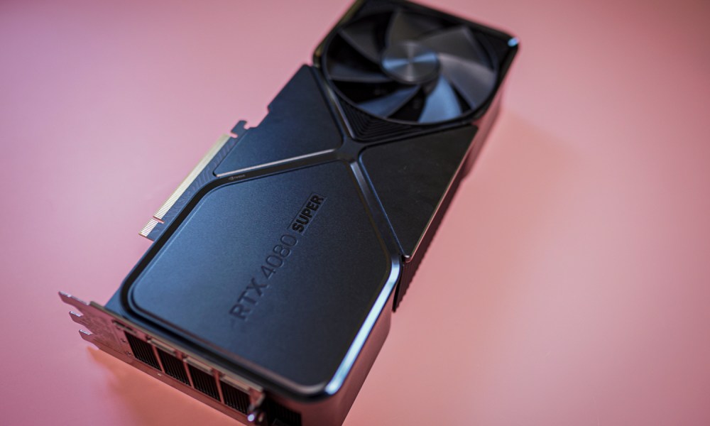 The RTX 4080 Super graphics card sitting on a pink background.