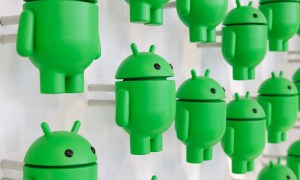 A photo of many Android figurines on a white wall.