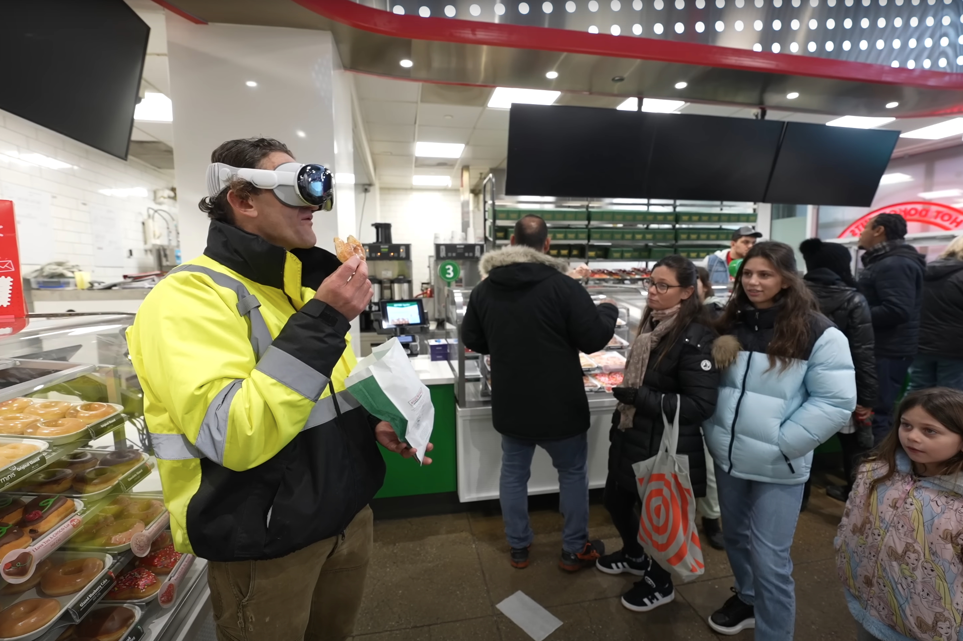 Casey Neistat wearing an Apple Vision Pro in a store in New York City.