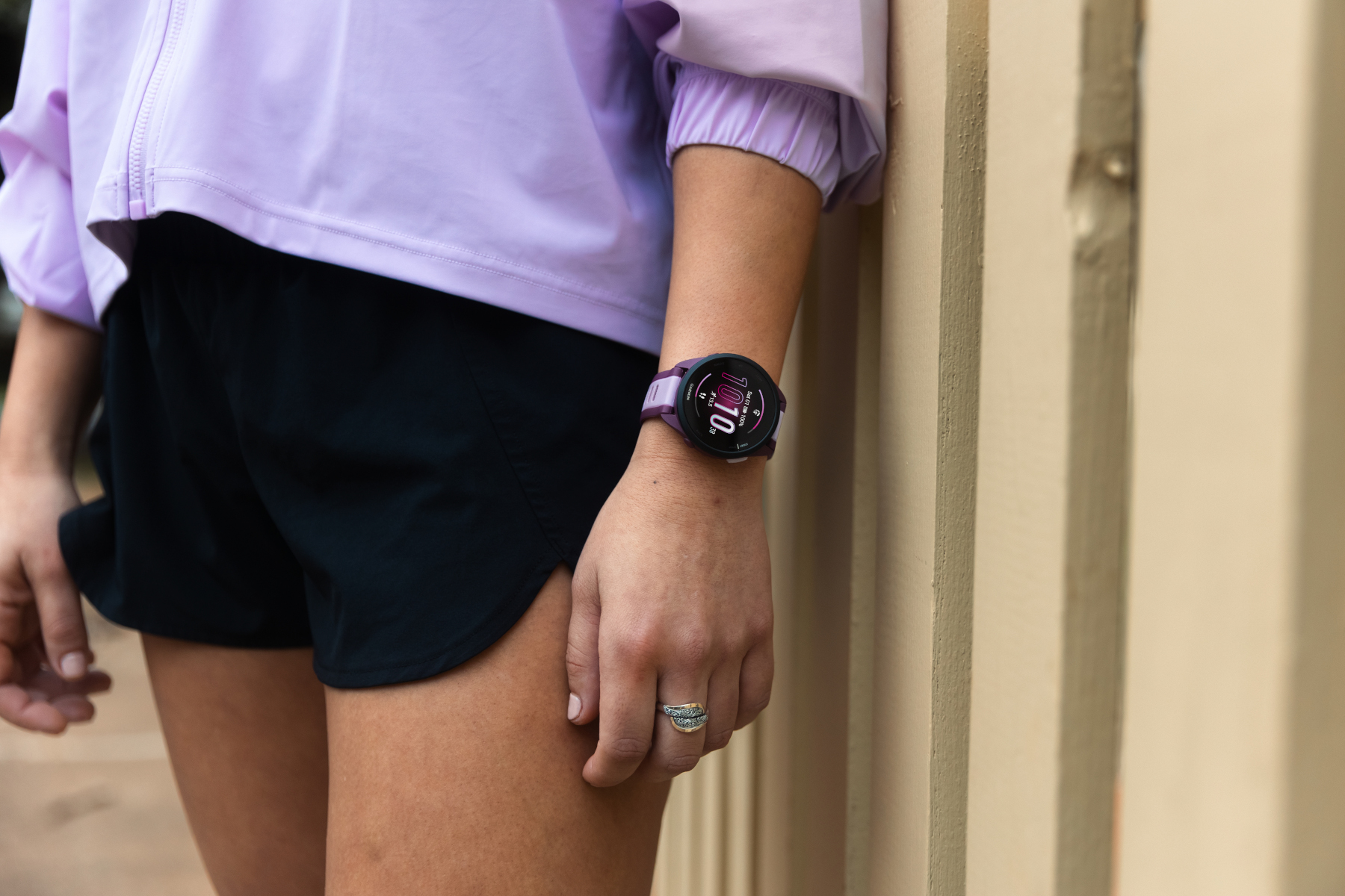 Garmin's Forerunner 165 being worn on a wrist.