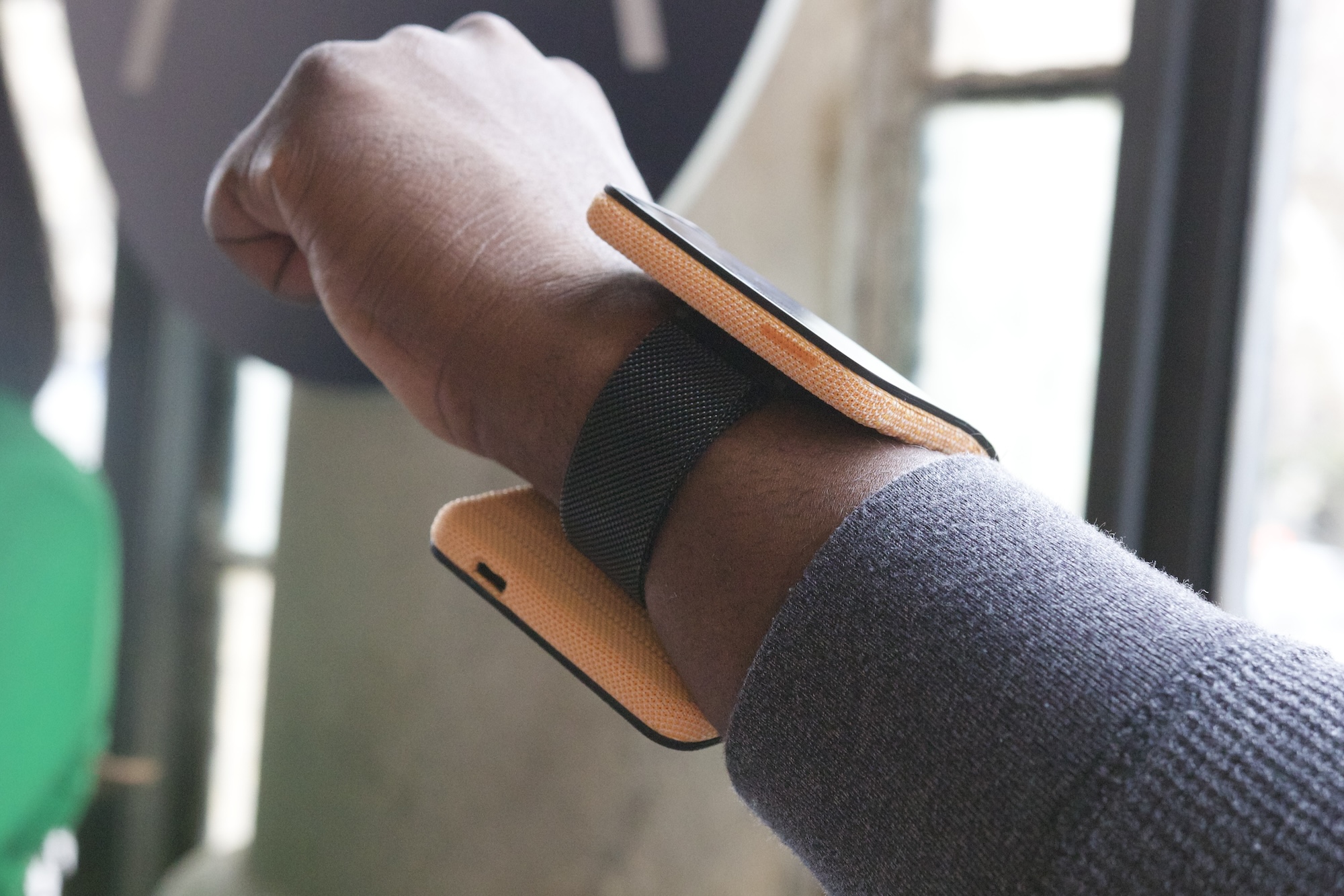 Someone wearing Motorola's concept folding phone on their wrist.