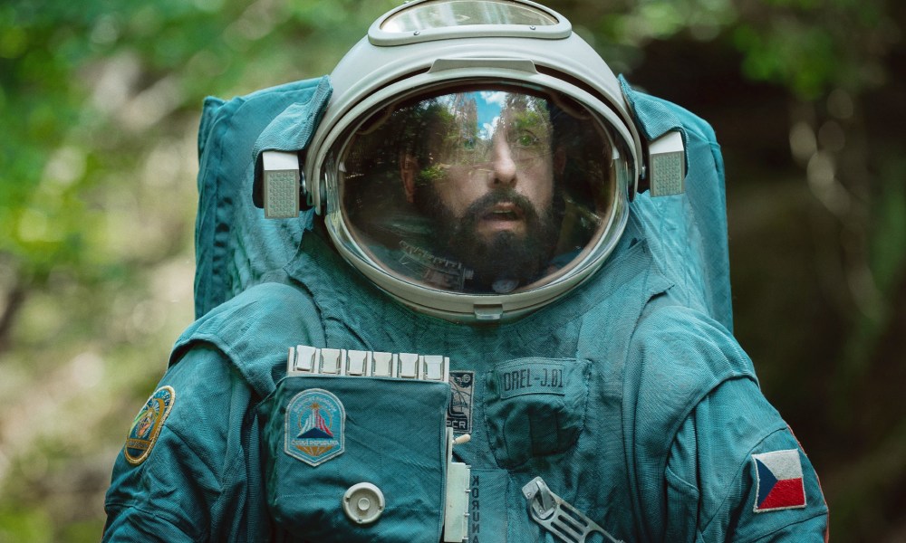 Adam Sandler wears a spacesuit in Spaceman.