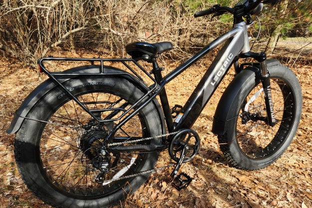 Lectric XPeak right rear three-quarter view parked on forest path