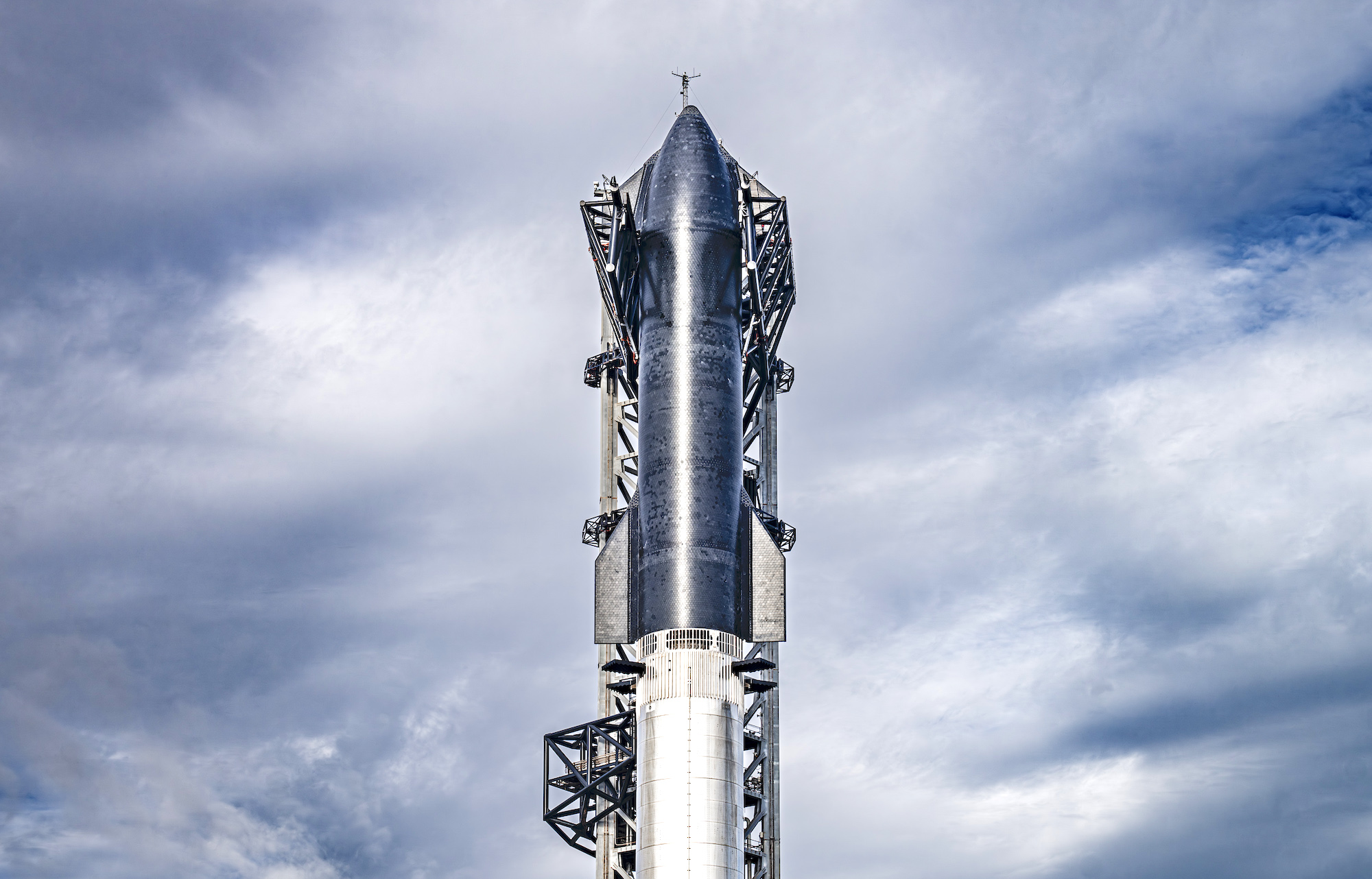 SpaceX's Starship spacecraft stacked atop the Super Heavy booster ahead of its third test flight.