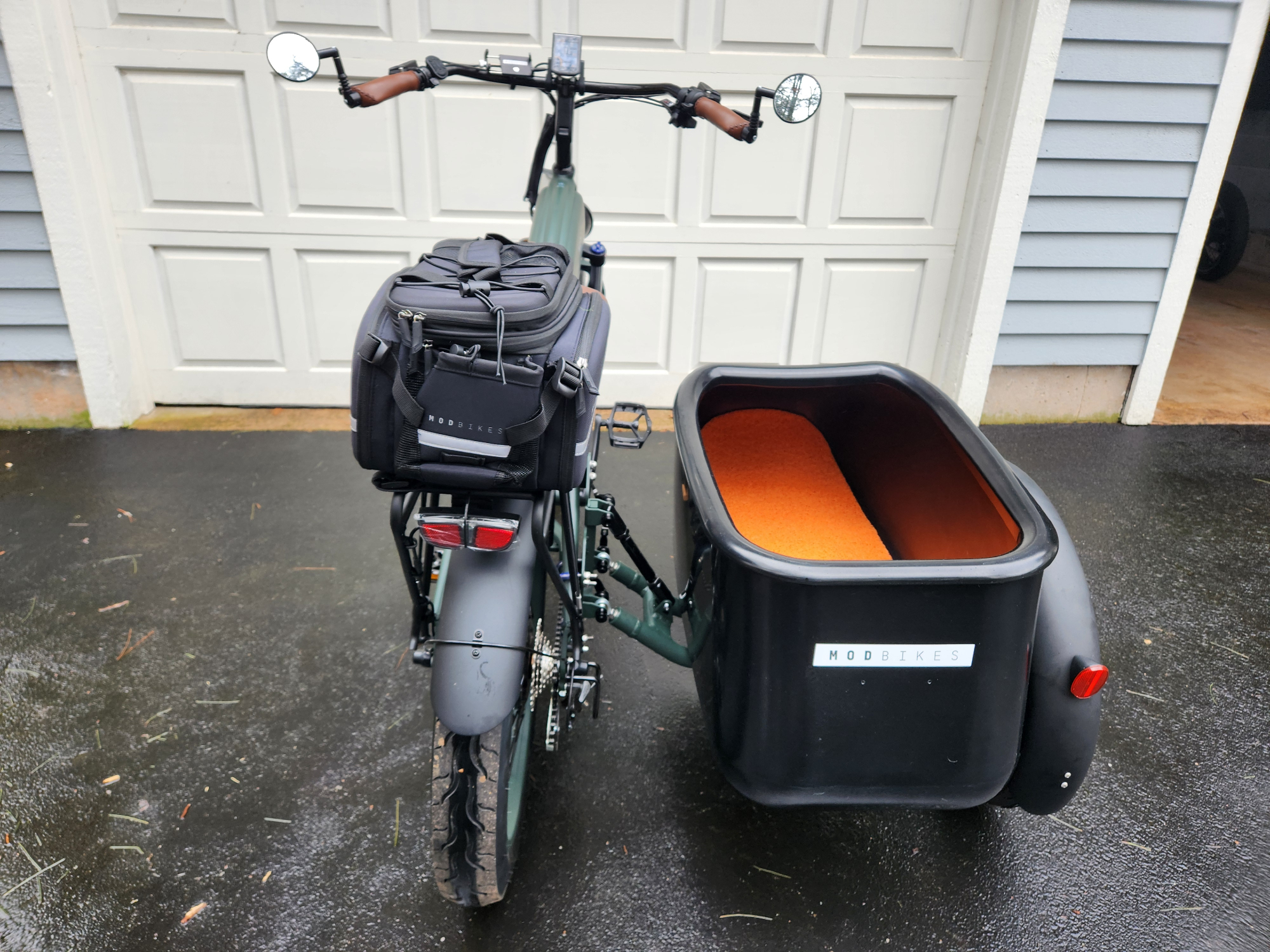 Direct rear view of a MOD Easy Sidecar with optional mirrors, phone mount, and rear rack bag.