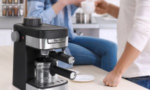 The Sboly coffee maker and espresso machine on a kitchen counter.