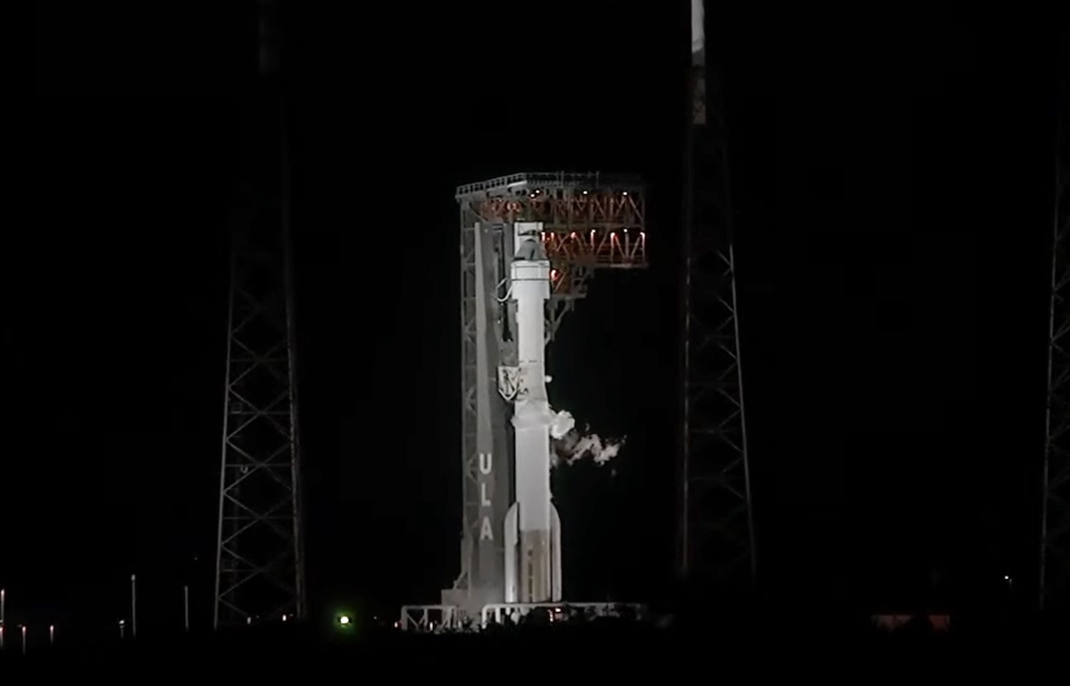 The Atlas V rocket and Starliner spacecraft on the launchpad.