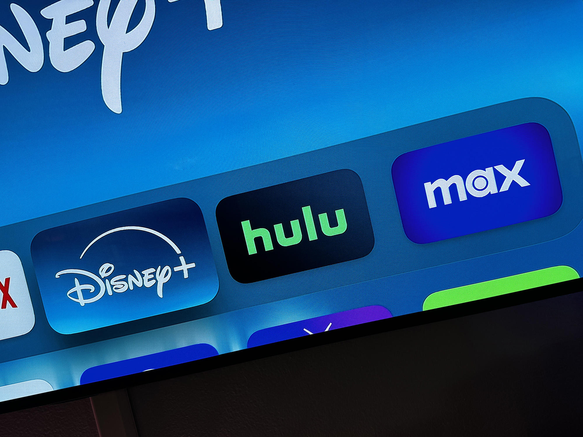 The Disney Plus, Hulu and Max icons on Apple TV.