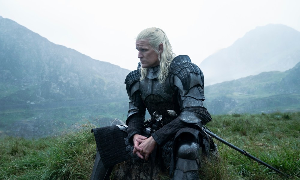 Daemon Targaryen sits in a field alone in House of the Dragon season 2.