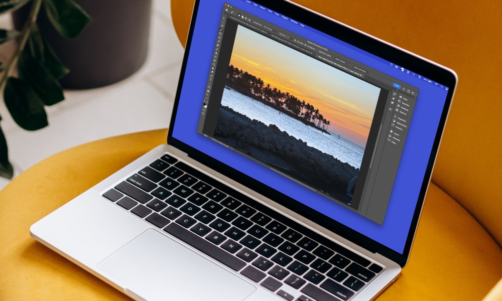 Edit a picture in Photoshop on a MacBook.