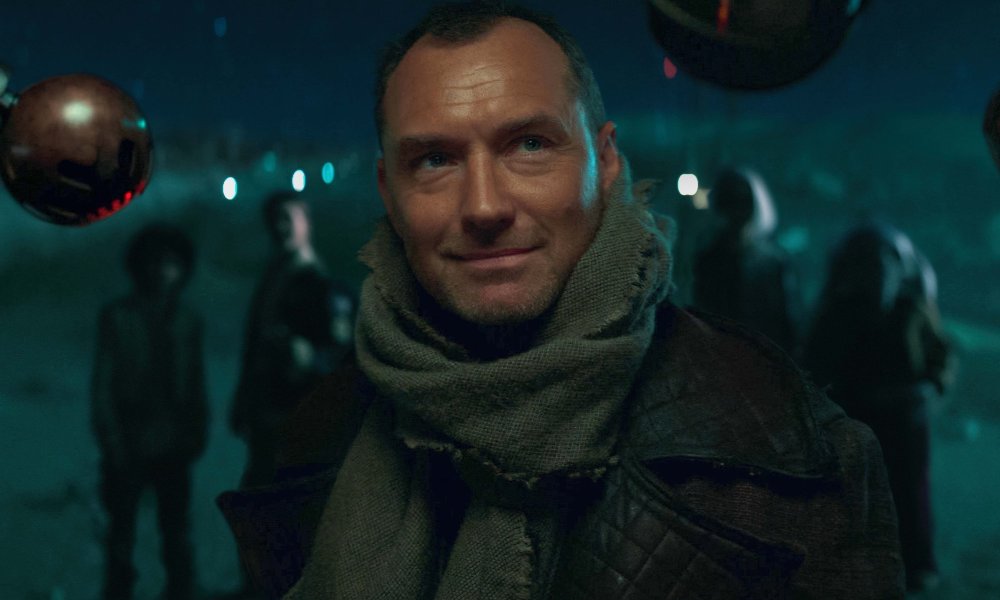 Jude Law smirks and stares on Skeleton Crew.