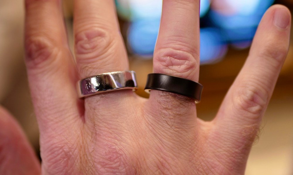 A person wearing the Samsung Galaxy Ring and the Oura Ring.