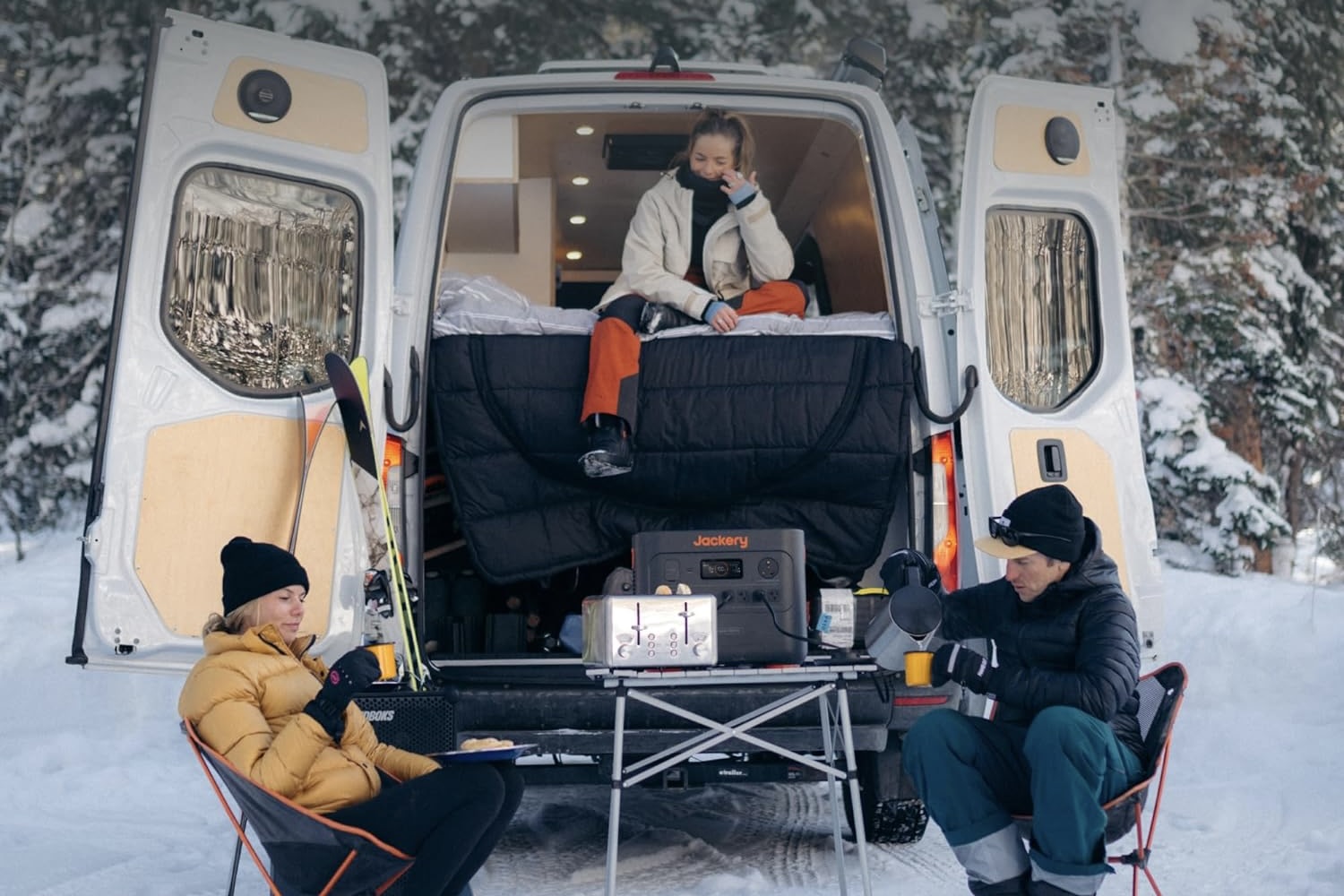 People using the Jackery Solar Generator 3000 PRO on a winter camping trip.