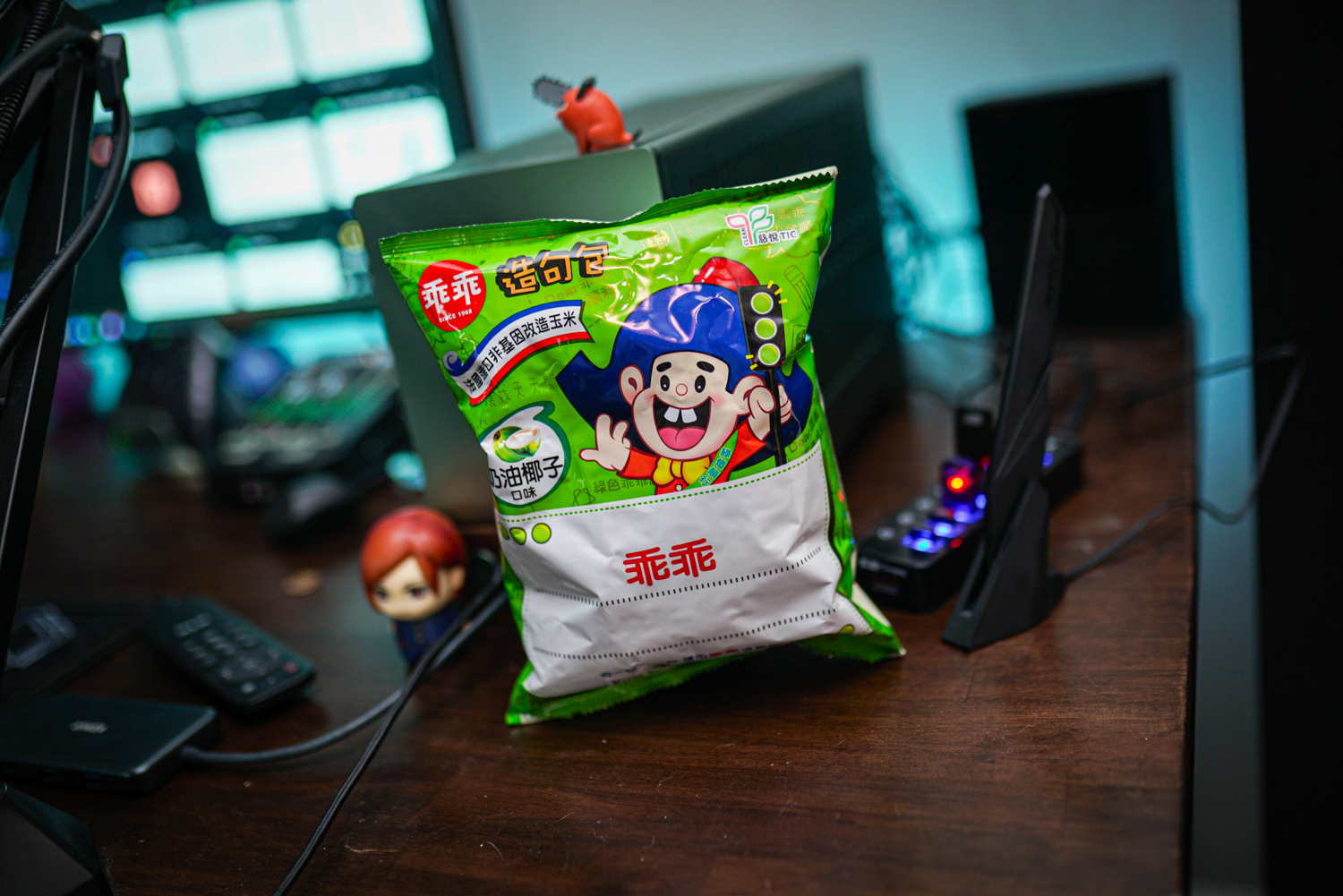 A pack of Kuai Kuai sitting on a gaming PC.