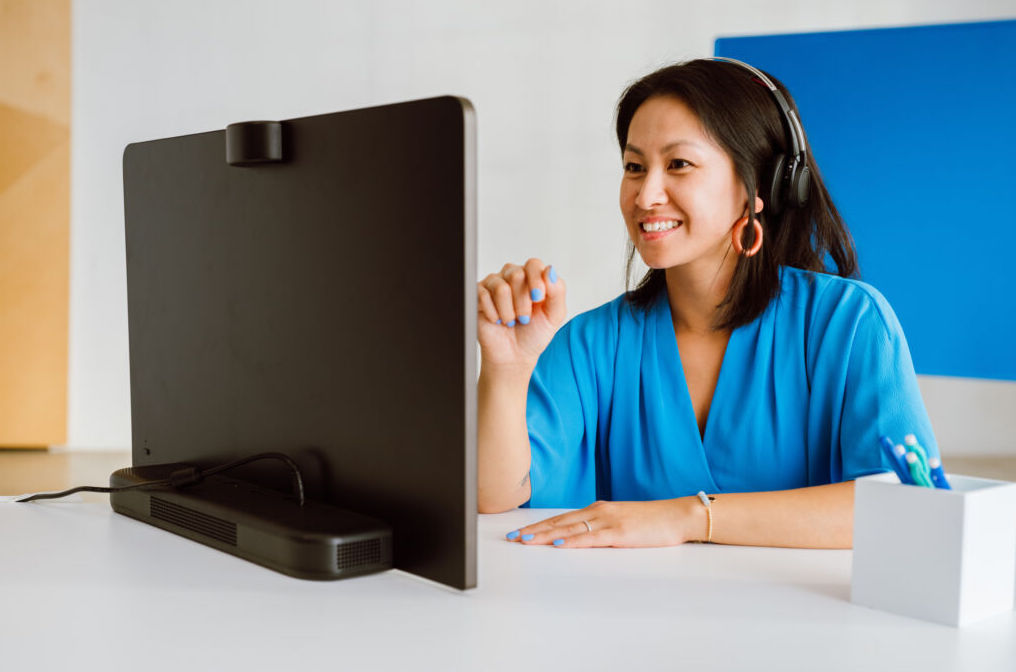 A woman participating in a Zoom call.