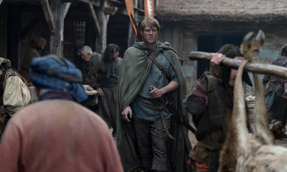 Ser Duncan the Tall walks in a village in A Knight of the Seven Kingdoms.