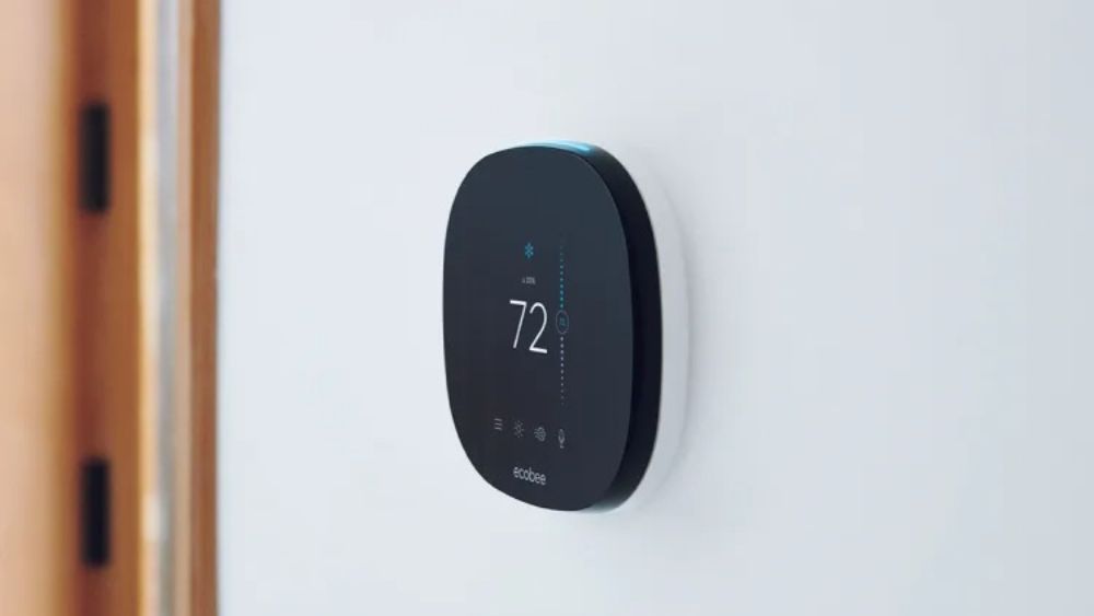 Ecobee Smart Thermostat installed on a wall.