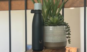 The Water.io water bottle on a tble.