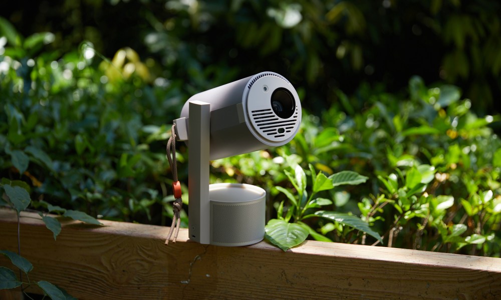 The Xgimi MoGo 3 Pro projector in nature.