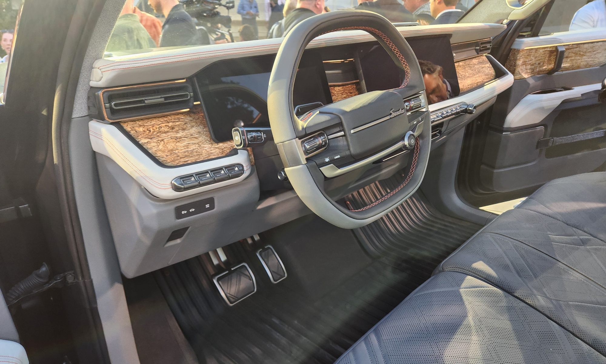 Front seat and dashboard of the Scout Terra electric truck.