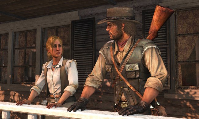 John Marston standing and talking with a woman with a rifle on his back.