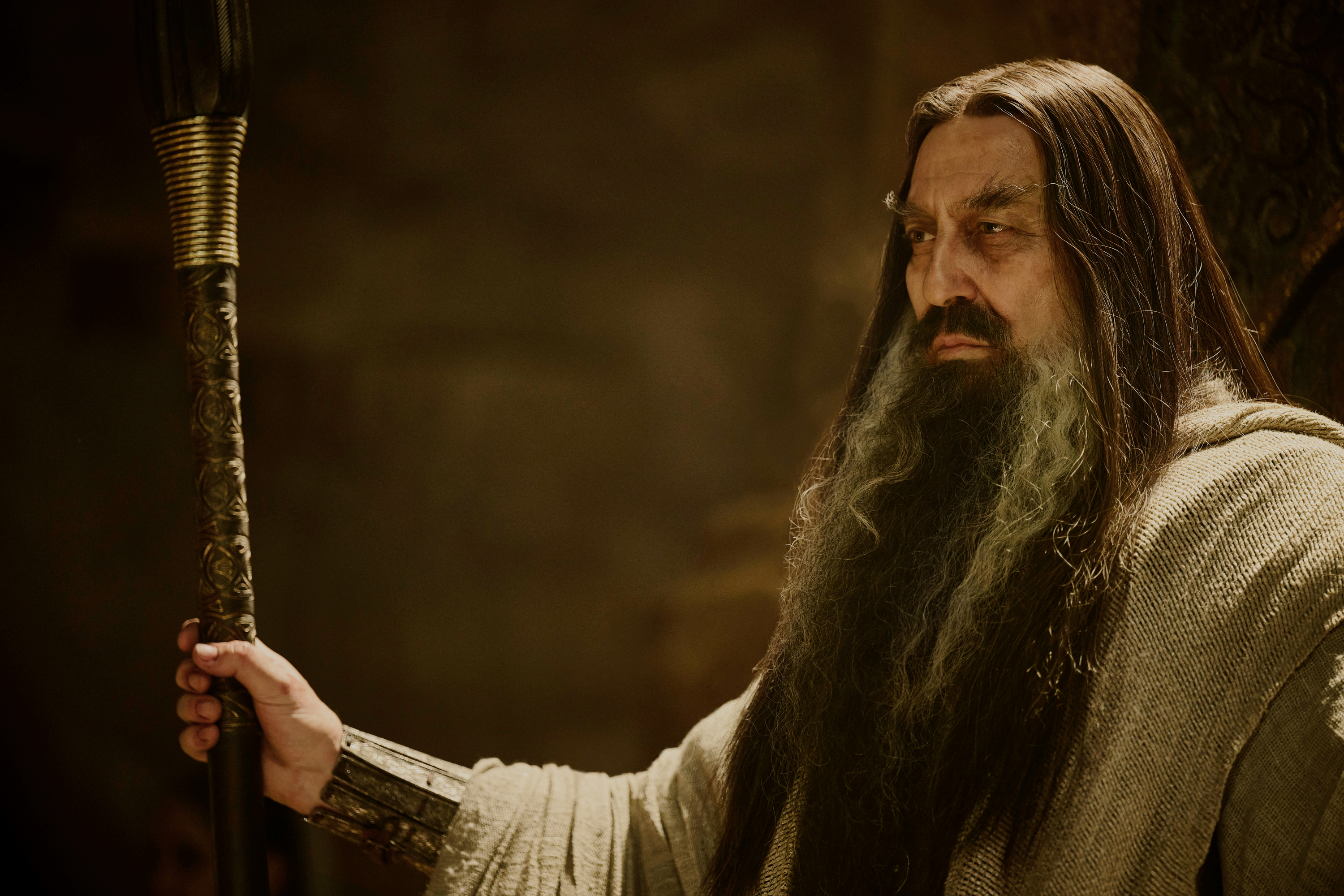 The Dark Wizard holds his staff in The Lord of the Rings: The Rings of Power season 2.