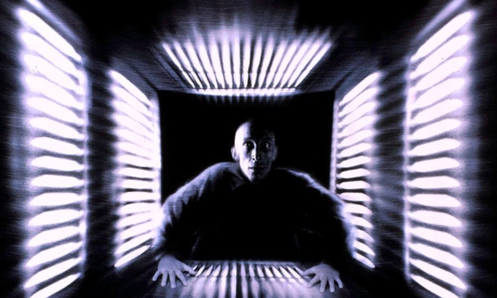 A man enters a trapped cube in Cube