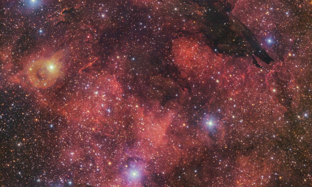 Fittingly nicknamed the Dark Wolf Nebula, this cosmic cloud was captured in a 283-million-pixel image by the VLT Survey Telescope (VST) at ESO’s Paranal Observatory in Chile. Located around 5300 light-years from Earth, the cold clouds of cosmic dust create the illusion of a wolf-like silhouette against a colourful backdrop of glowing gas clouds.