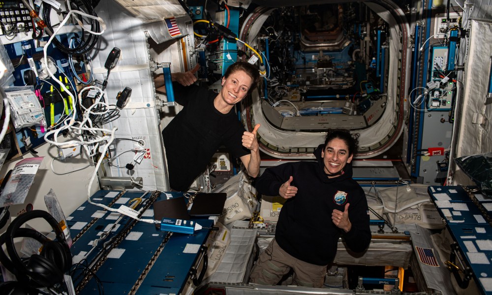 NASA astronauts Loral O’Hara and Jasmin Moghbeli (from left) give a thumbs up after voting as Texas residents from the International Space Station. The duo filled out electronic absentee ballots in March 2024 and downlinked them to Mission Control at NASA’s Johnson Space Center in Houston, which relayed the votes to the county clerk’s office.